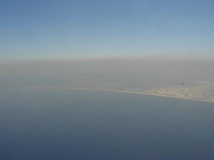 Smog over LA (the city is in there somewhere!).  Really!<br>Location: <a href="https://www.google.com/maps/search/?api=1&query=33.95942,-118.55325" target="_new">Over Pacific Ocean</a>